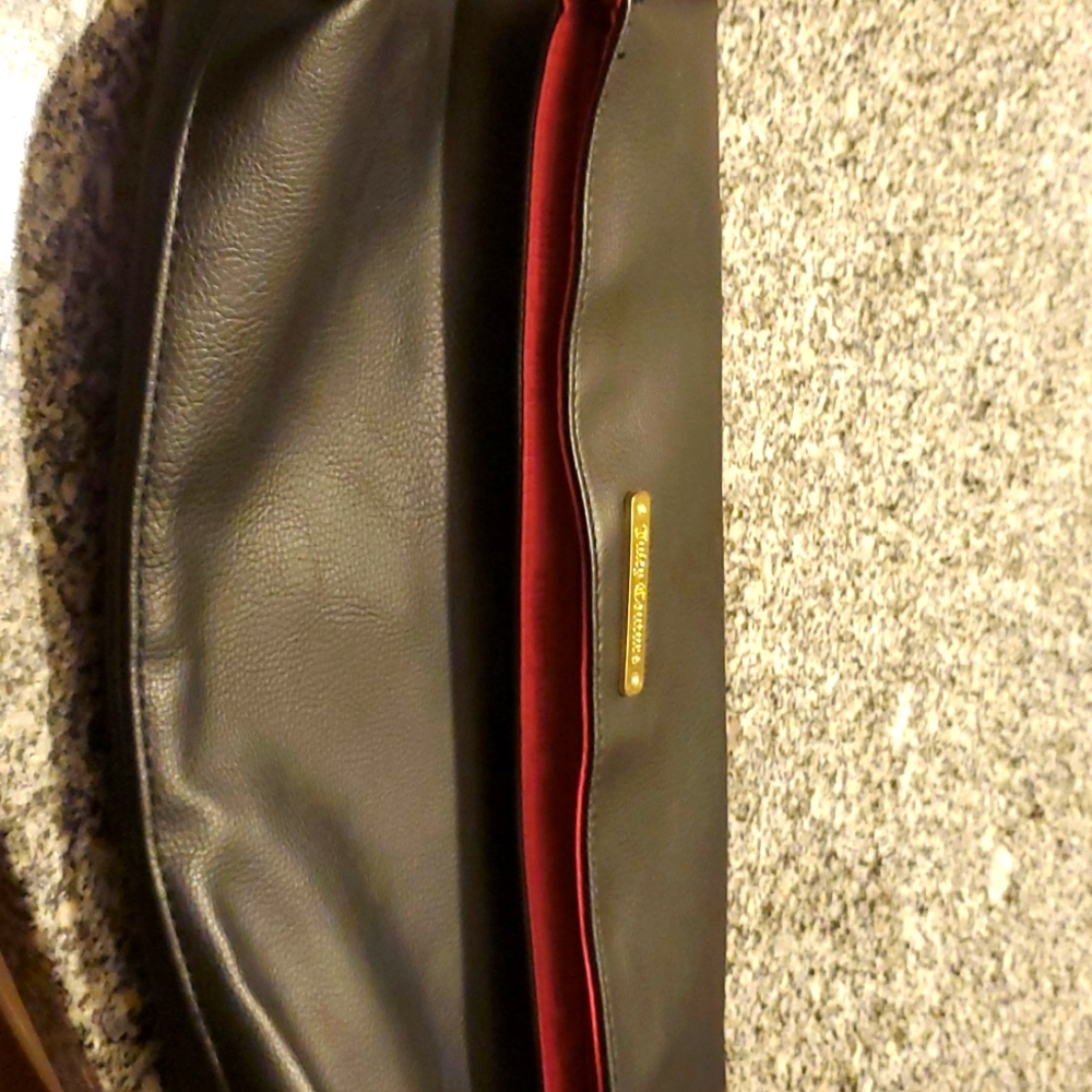 Black and pink Juicy Couture clutch
